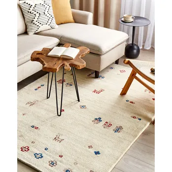 Koberec Koberec gabbeh béžový vlněný 140 x 200 cm květovaný motiv zvířecí vzor ručně všívaný obývací pokoj ložnice tradiční boho styl Beliani