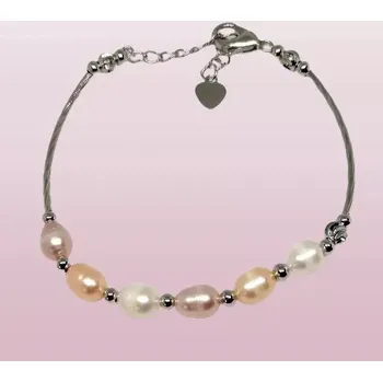 Náramek Náramek z droboučkých říčních perel s chirurgickou ocelí (menší obvod náramku)