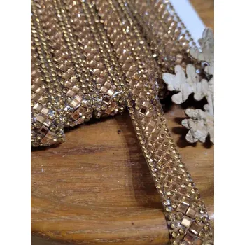 Textilní nažehlovací páska Prýmek s broušenými skleněnými kamínky šíře 14 mm nažehlovací barva zlatá tmavá