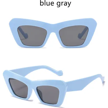 Elegantní sluneční brýle s masivními hranatými obrubami tvarem kočičích očí Barva: modrá