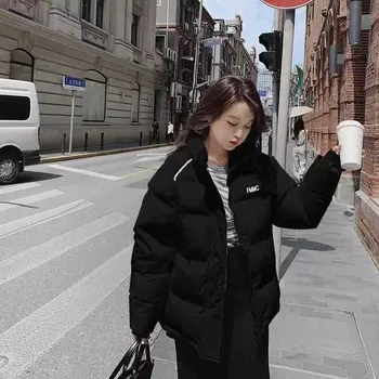 Dámská zimní bunda moderního volného střihu Barva: Černá, Velikost: L