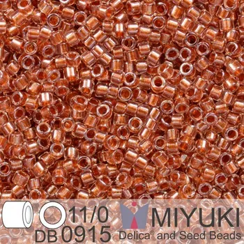 Korálek Korálky Miyuki Delica 11/0. Barva Spkl Ginger Lined Crystal DB0915. Balení 5g.