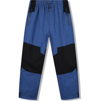 Pánské plátěné kalhoty - KUGO FK7611, modrá Barva: Modrá, Velikost: XXL