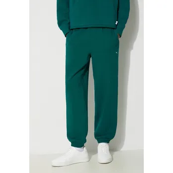 Bavlněné tepláky Puma MMQ Sweatpants zelená barva, 624007, XL, 67X