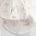 Kojenecká čepice New Baby Zoe Dětská letní mušelínová čepička s kšiltem bílá