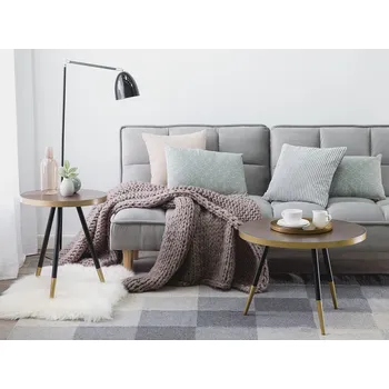 Konferenční stolek Konferenční stolek tmavý jasan černý zlaté nohy stativov podnožka kulatý tvar retro moderní styl obývací pokoj Beliani