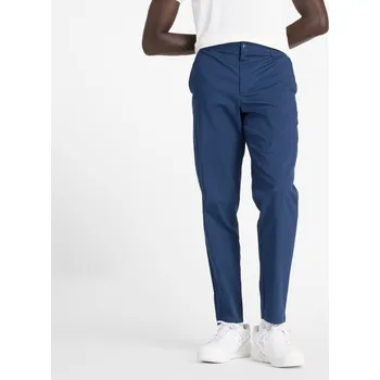 Pánské kalhoty Pánské kalhoty New Balance MP43554NNY – tmavomodrá