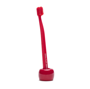 Zubní kartáček Roots set zubní kartáček a stojánek, červený