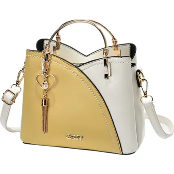 Dámská menší kabelka se srdíčkovým přívěskem Barva: žlutá C