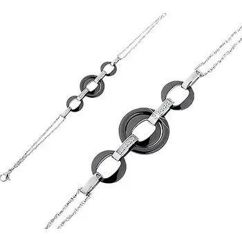 Náramek Náramek z chirurgické oceli a z keramiky, kruhy černé barvy, ovály se zirkony