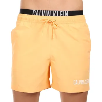 Pánské plavky Pánské plavky Calvin Klein oranžové (KM0KM00992-SAN) XL KM0KM00992-SAN Možnost vrácení zboží ZDARMA do 120 dnů!