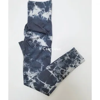 Dámské legíny Dámské legíny s abstraktním vzorem Barva: Šedá, Velikost: M