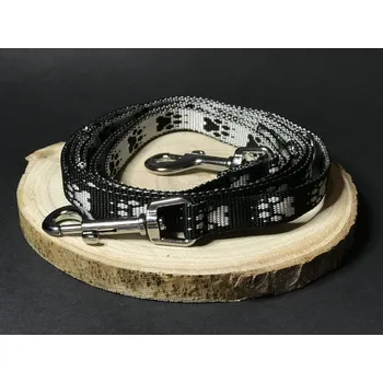 Vodítko pro psa Palkar vodítko přepínací z popruhu pro psy 250 cm x 16 mm černo-bílá s tlapkami (Palkar vodítko přepínací z popruhu pro psy 250 cm x 16 mm černo-bílá s tlapkami)