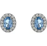 Stříbrné náušnice se světle modrými zirkony