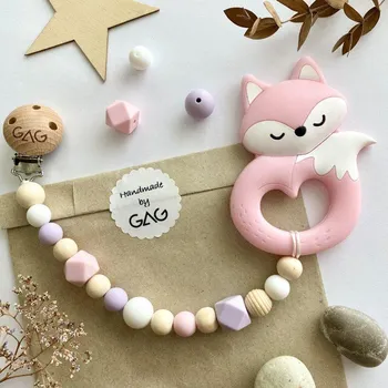 GAG design Kousátko na klipu silikonové Hryzátko lišák Světluška