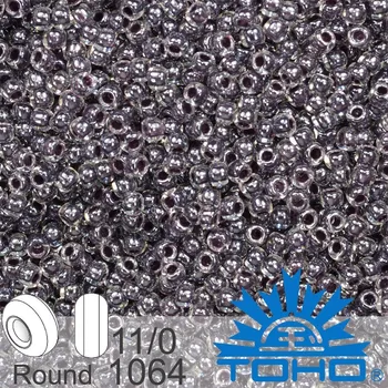 Korálek Korálky TOHO tvar ROUND (kulaté). Velikost 11/0. Barva č.1064 Inside-Color Crystal/Concord Grape-Lined. Balení 8g