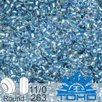 Korálek Korálky TOHO tvar ROUND (kulaté). Velikost 11/0. Barva č. 263 Inside-Color Rainbow Crystal/Lt Capri-Lined. Balení 8g.