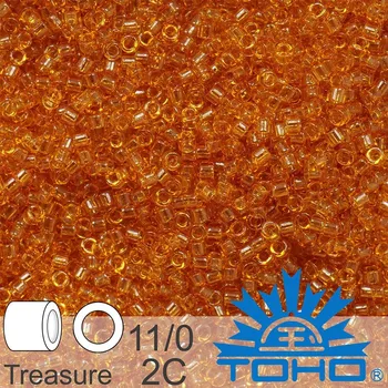 Korálek Korálky TOHO tvar TREASURE (válcové). Velikost 11/0. Barva č. 2C-Transparent Topaz . Balení 5g.
