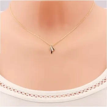 Přívěsek Přívěsek ve žlutém 14K zlatě - dvě černé vlnky, linie čirých zirkonků