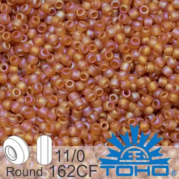 Korálek Korálky TOHO tvar ROUND (kulaté). Velikost 11/0. Barva č.162CF-Trans-Rainbow-Frosted Dark Topaz . Balení 8g.