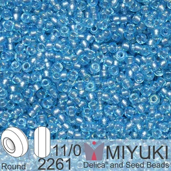 Korálek Korálky Miyuki Round 11/0. Barva 2261 Light Gray Lined Aqua AB. Balení 5g.