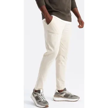 Pánské tepláky s logem krémové