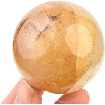 Přírodní kámen Křišťál s limonitem hladká koule 180g