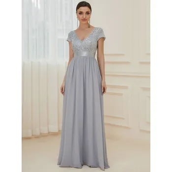 Dámské oblečení Elegantní šaty s véčkovým výstřihem a třpytivým topem Barva: Stříbrná, Velikost: M