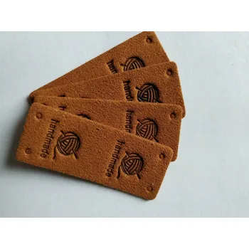 Koženkový štítek půlený Hand made klubko 5x2cm hnědý