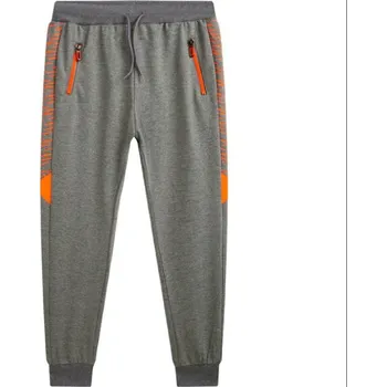 Chlapecké tepláky KUGO MT1618, šedý melír