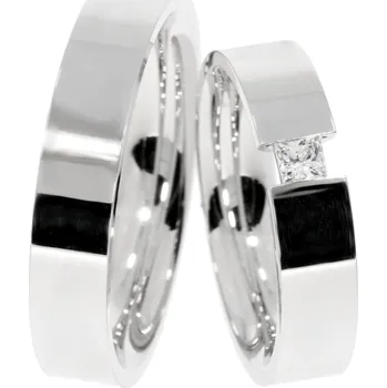 Prsten Zlaté snubní prsteny ST-164 Kameny: Se Zirkony