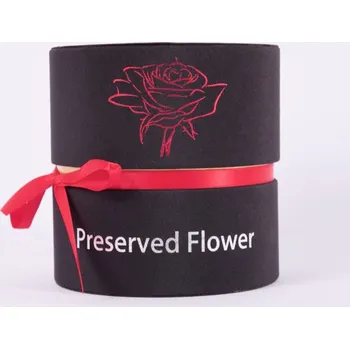 Medvídárek Kulatý box se 7 stabilizovanými červenými růžemi 13 x 14 cm