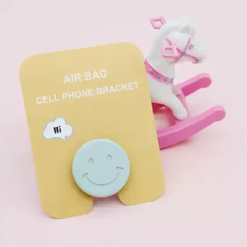 Držák na telefon | stojánek na mobil - více stylů - Modrá tvář