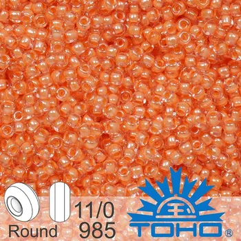 Korálek Korálky TOHO tvar ROUND (kulaté). Velikost 11/0. Barva č. 985-Inside-Color Crystal/Salmon Lined . Balení 8g.