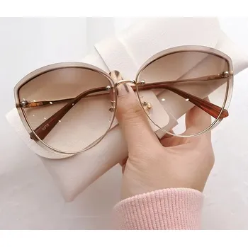 Sluneční brýle Oválné dámské bezobroučkové sluneční brýle cat eye - Zlatý čaj