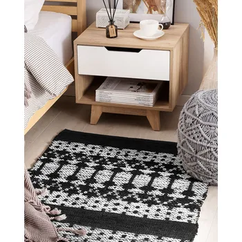 Koberec Koberec černá béžová pravá kůže 80 x 150 cm krátký vlas orientálního designu ručně vyráběný obdélníkový Beliani