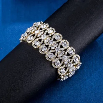 Náramek Luxusní štrasový mohutný náramek z broušených zirkonů zlatý