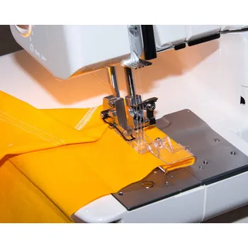 Příslušenství k šicímu stroji Merrylock - patka se zakladačem na podehnutý lem