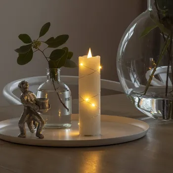 Vánoční světelná dekorace Konstsmide Christmas LED vosková svíčka krémová barva jantarová 17,8 cm krémově bílá, stříbrná 10 LED diod - celkem 0,1 W - Doprava zdarma