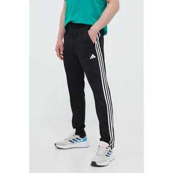 Dámské kalhoty Tréninkové kalhoty adidas Performance Train Essentials IB8168 černá 99X, vel. M