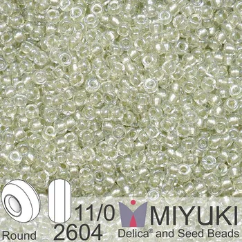 Korálek Korálky Miyuki Round 11/0. Barva 2604 Sparkling Celery Lined Crystal AB. Balení 5g.