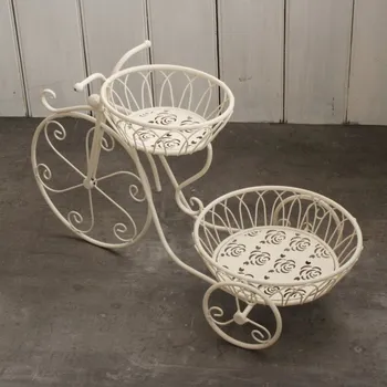 Stojan na květiny Kovový stojan na květiny kolo bílý 65x40cm