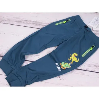 Tepláky Kugo s dinosaury petrolejové velikost oblečení - děti: 98