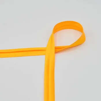 Saténový lemovací proužek, zažehlený, tmavě žlutý, 20mm