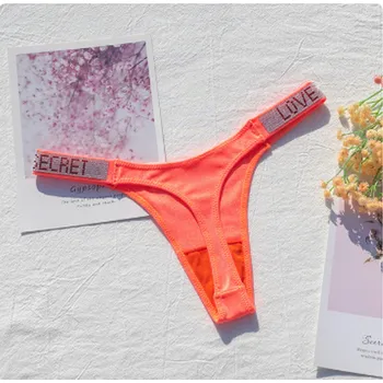 Kalhotky Dámské kalhotky ve střihu "G-string" s lesklými kamínky na bocích Barva: Oranžové - chengse, Velikost: L