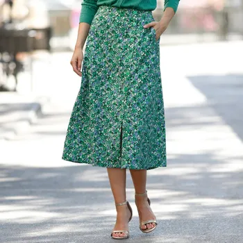 Dámská sukně Sukně s bočním rozparkem na knoflíky a potiskem zelená/lila 36
