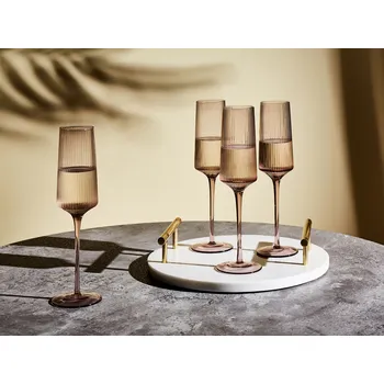 Sklenice Sada 4 sklenic na šampaňské růžová průhledné foukané sklo žebrované úzké flauty ručně vyrobené objem 220 ml Beliani