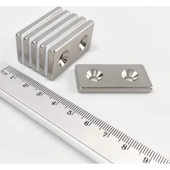 Dekorativní magnet Neodymový magnet kvádr 40x20x4 mm s 2 dírami M4 - jižní pól na straně s prohlubněmi - N38