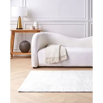 Koberec koberec světle šedý viskózový 140 x 200 cm s krátkým vlasem moderní Beliani