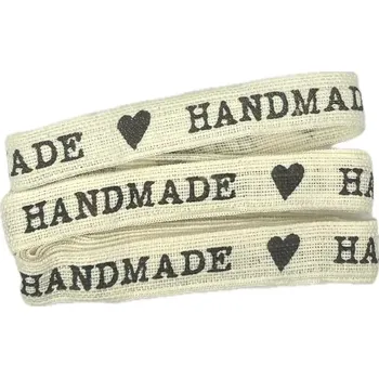 Stuha Stuha bavlněná HANDMADE s potiskem 15mm x 2m (7,-Kč/m) (Dekorační bavlněná stuha, barva smetanová, jednostranný černý potisk HANDMADE)